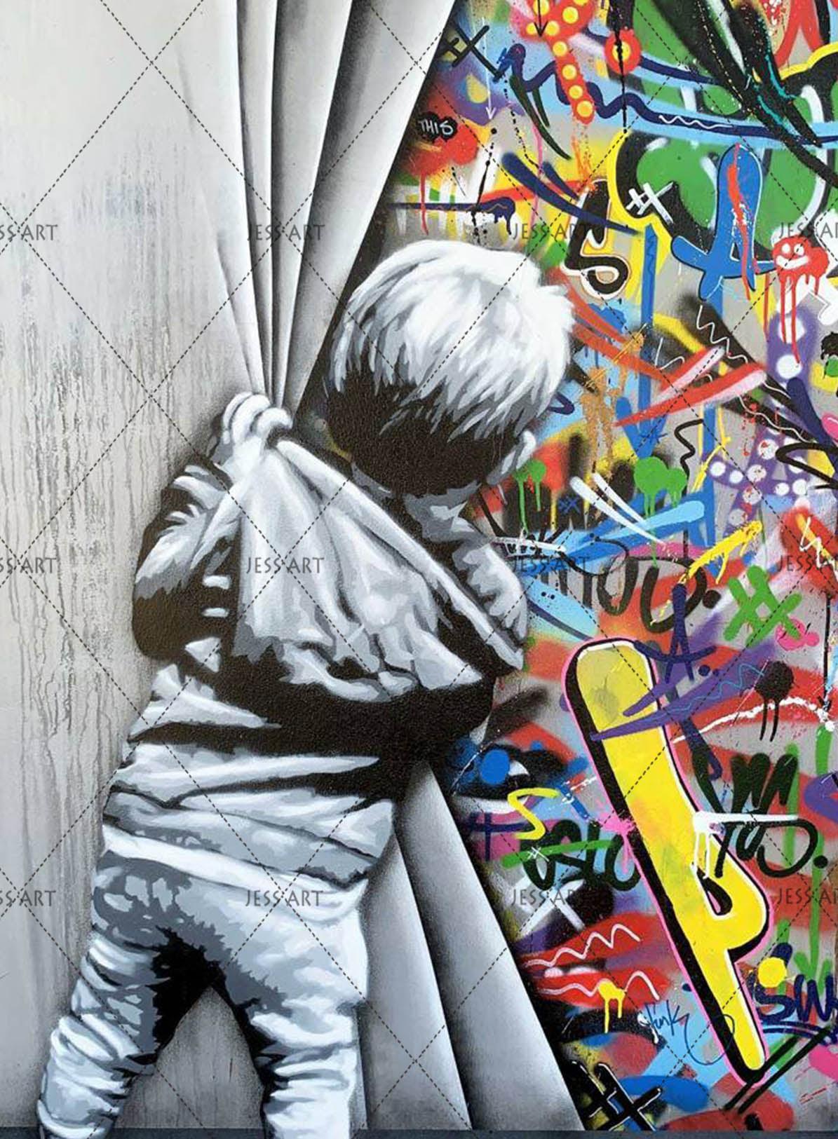 A child pulling a curtain in front of colorful graffiti